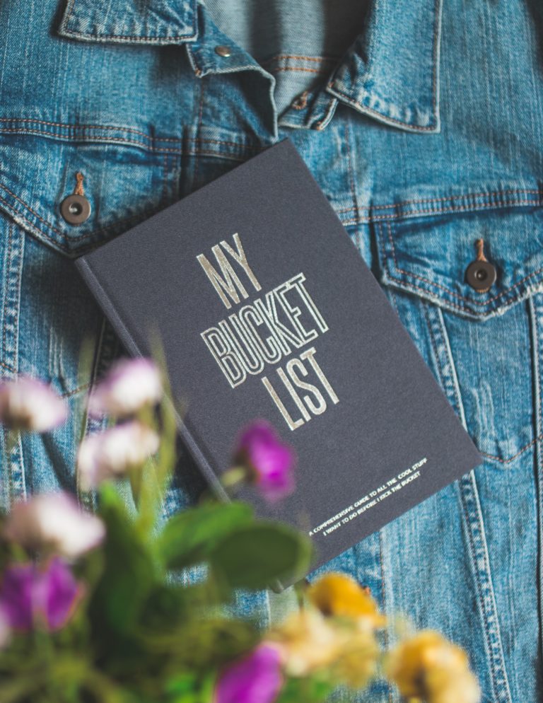 a person's jeans with a book on it