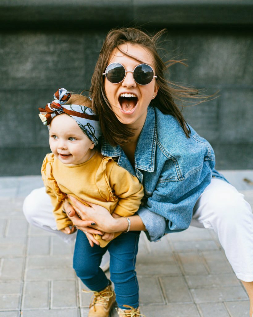 a person holding a baby